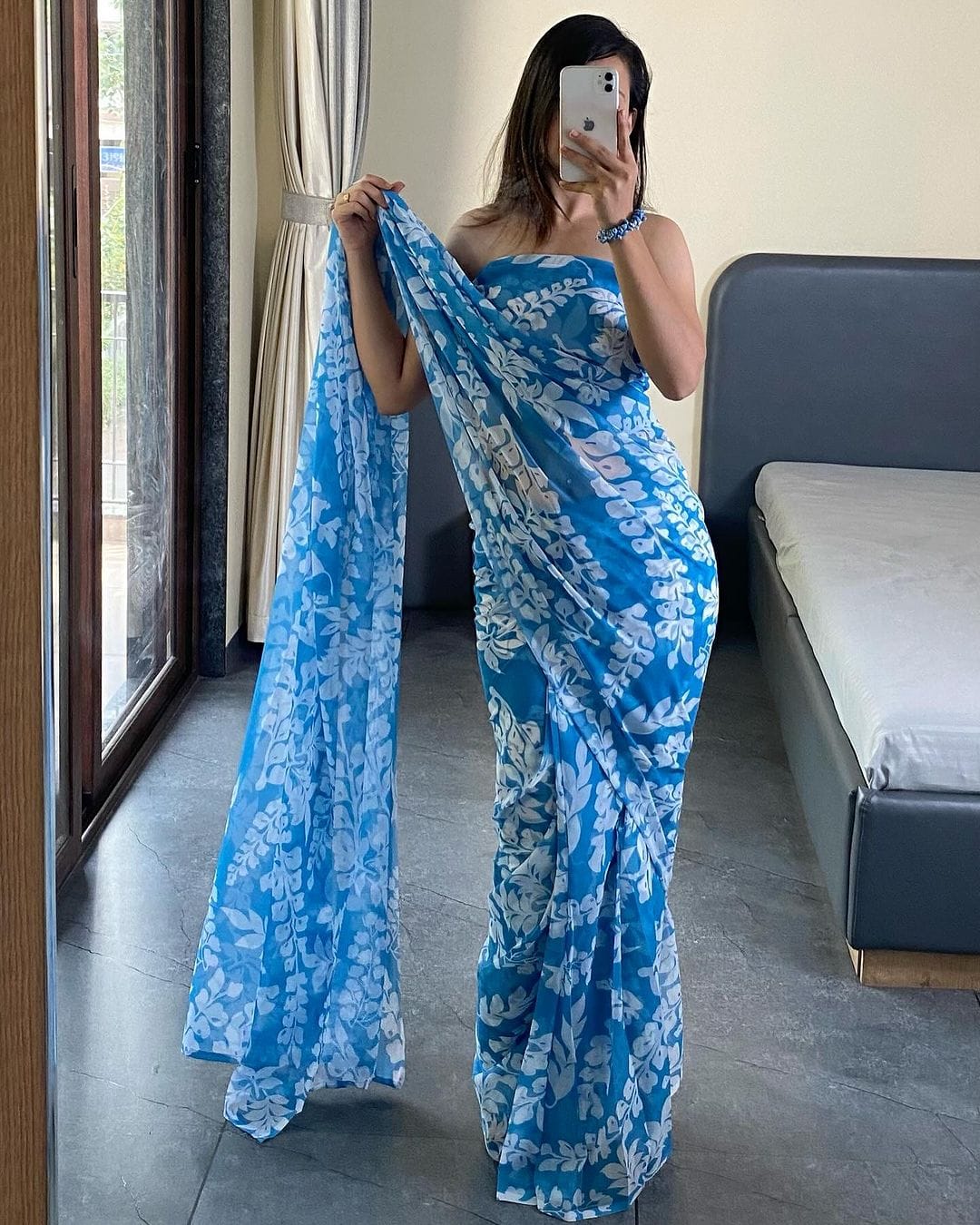 Elevate Your Wardrobe with This Stunning Firozi Georgette Saree