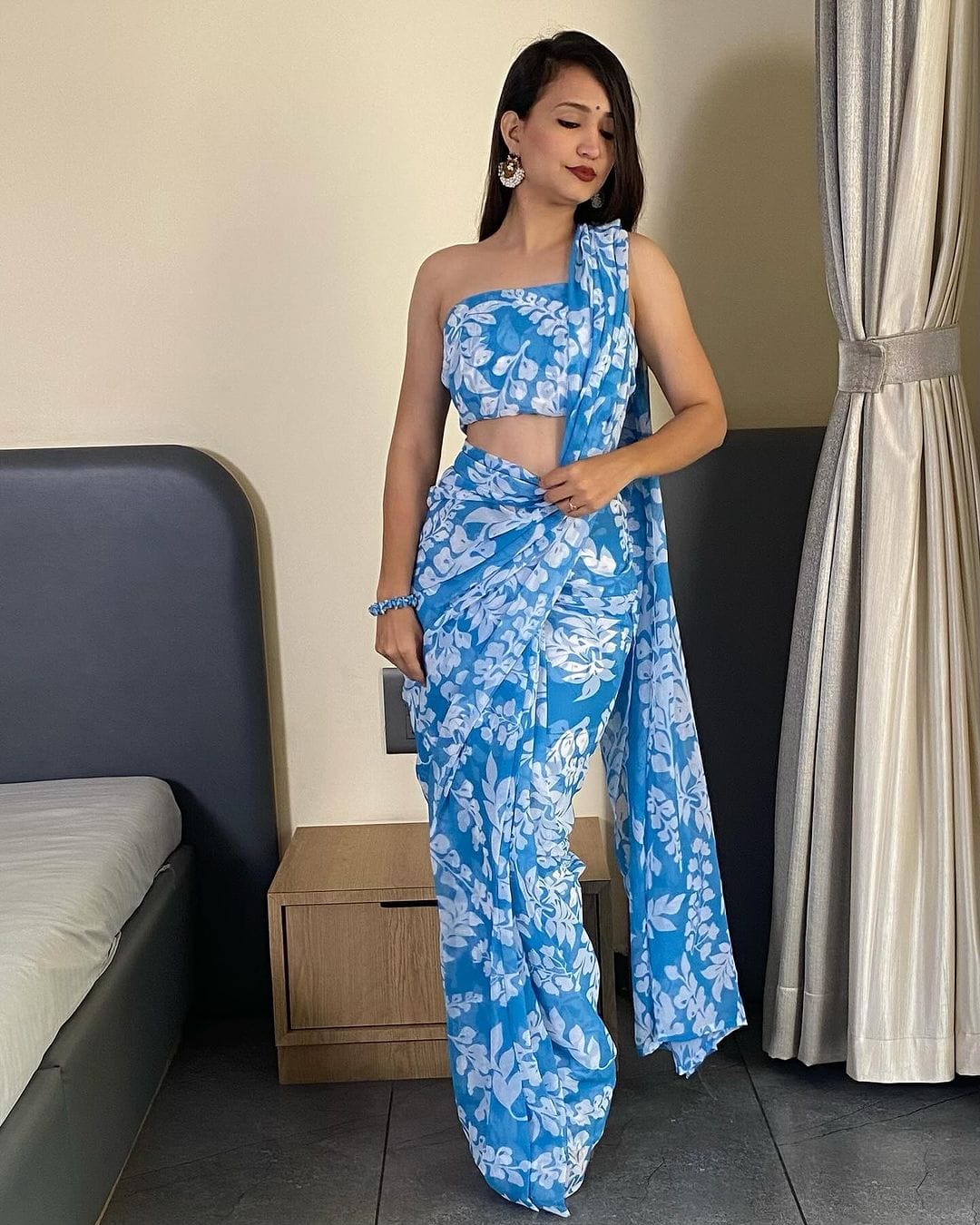 Elevate Your Wardrobe with This Stunning Firozi Georgette Saree