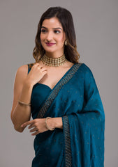 Teal Semi Crepe Saree with Silver Stonework – Elegant Celebration Wear