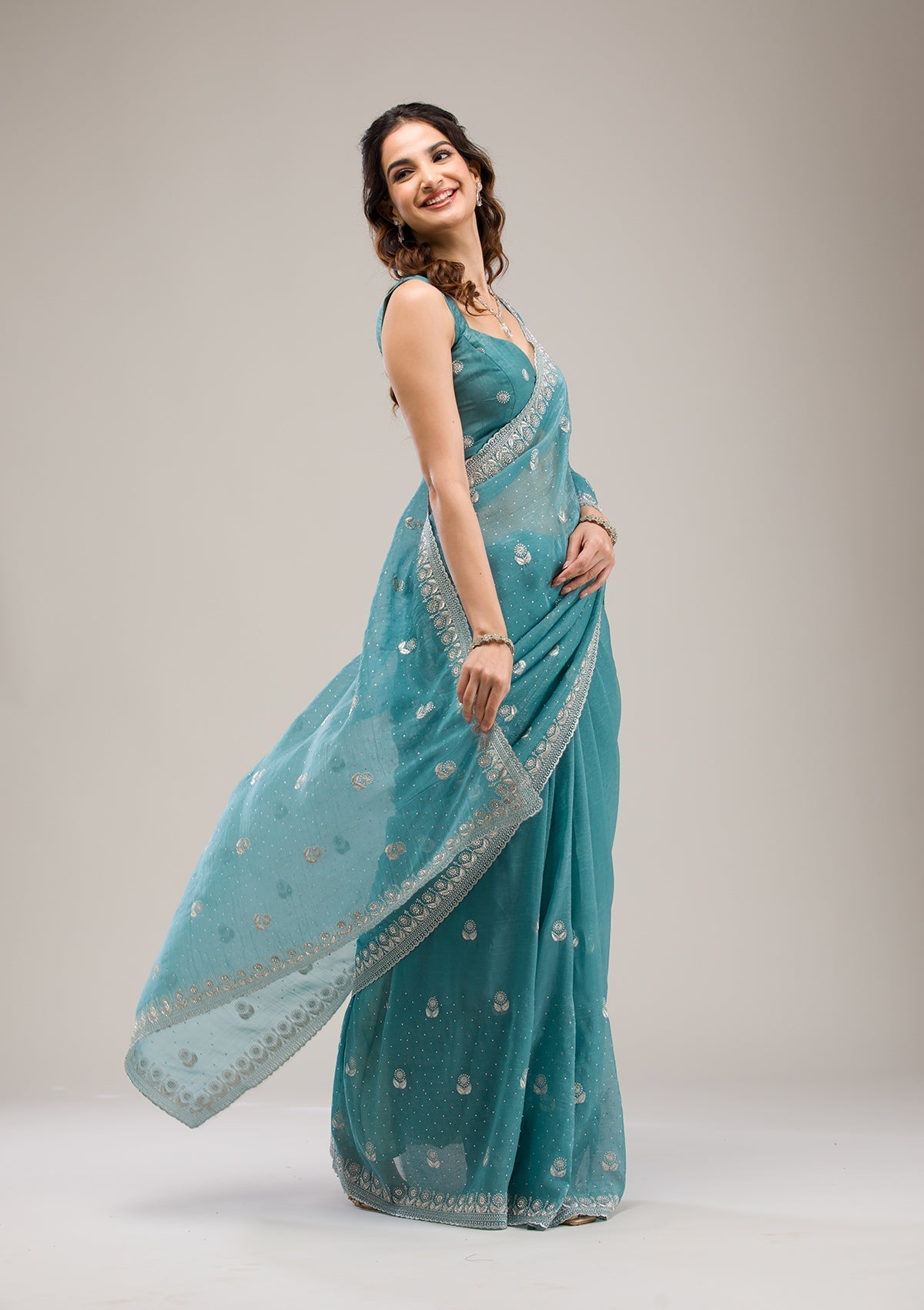 Teal Tissue Saree with Silver Zariwork – Elegant & Sheer Ethnicwear