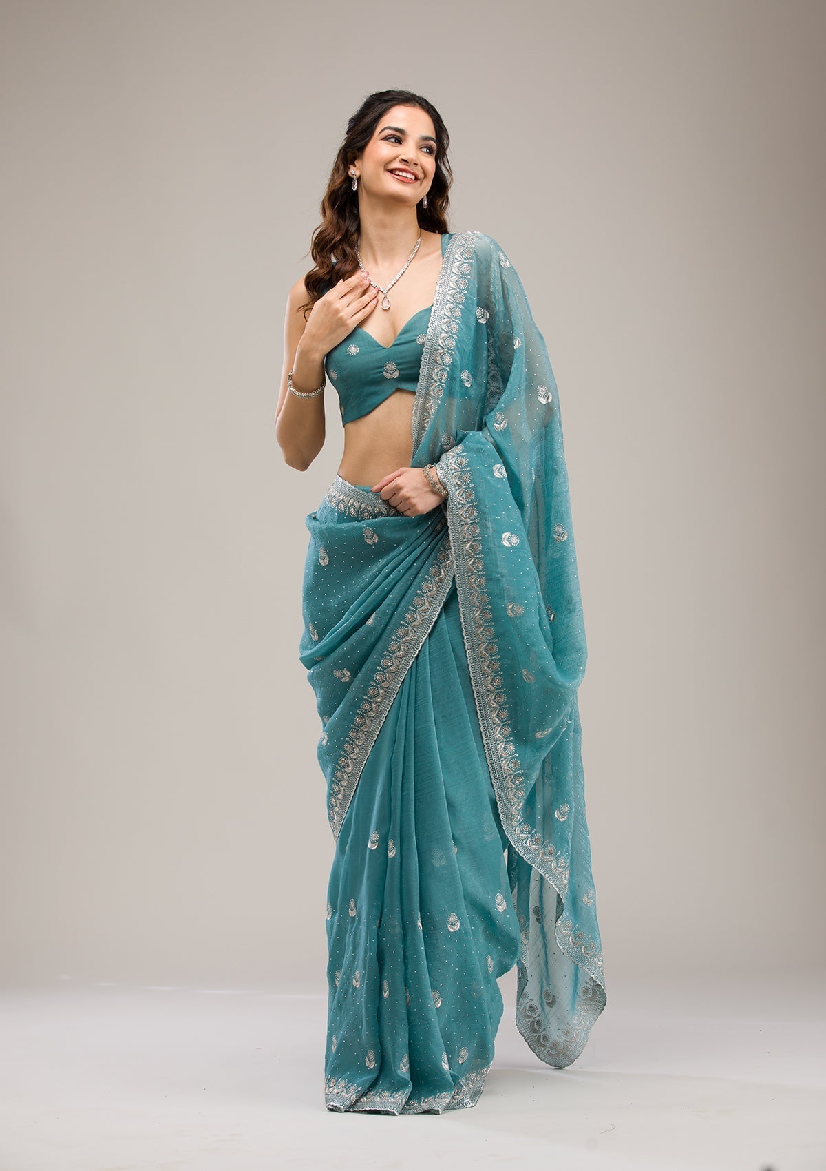 Teal Tissue Saree with Silver Zariwork – Elegant & Sheer Ethnicwear